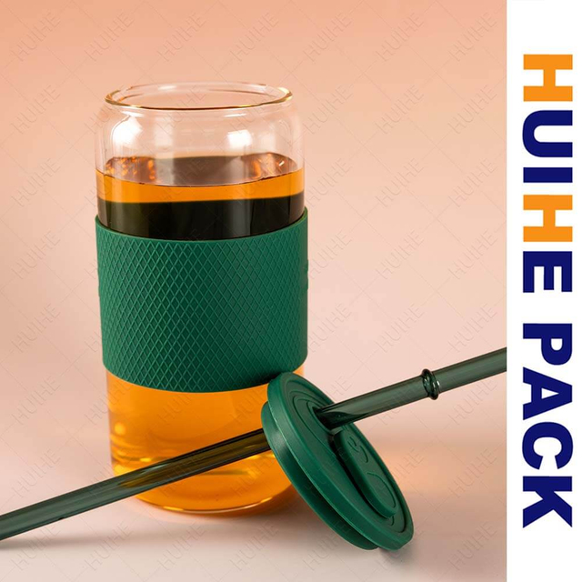 Bottiglia per bevande alta cilindrica in vetro borosilicato trasparente con cinturino in silicone