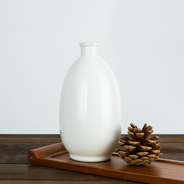 Bottiglia per liquori rotonda in vetro opale da 50 cl