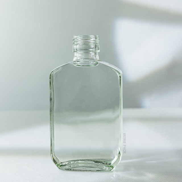 Bottiglia per bevande in vetro con boccetta da 110 ml con tappo a vite all'ingrosso