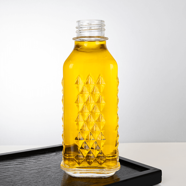 650 ml Modello in rilievo in bottiglia di liquore in vetro a forma di diamante