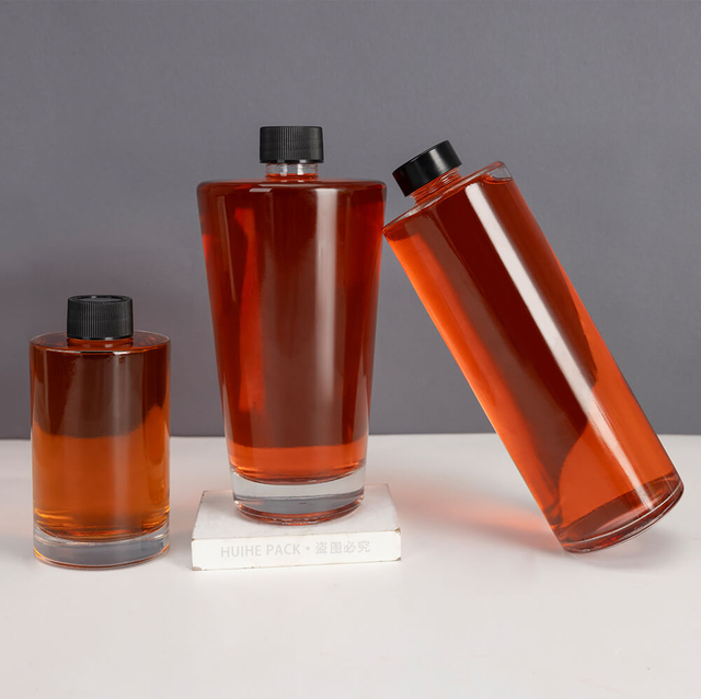 Nump a vite corta Spalla piatta in vetro rotondo bottiglie