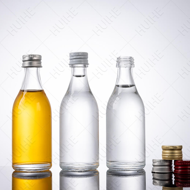 Piccole bottiglie di alcol in vetro flint trasparente rotondo da 50 ml