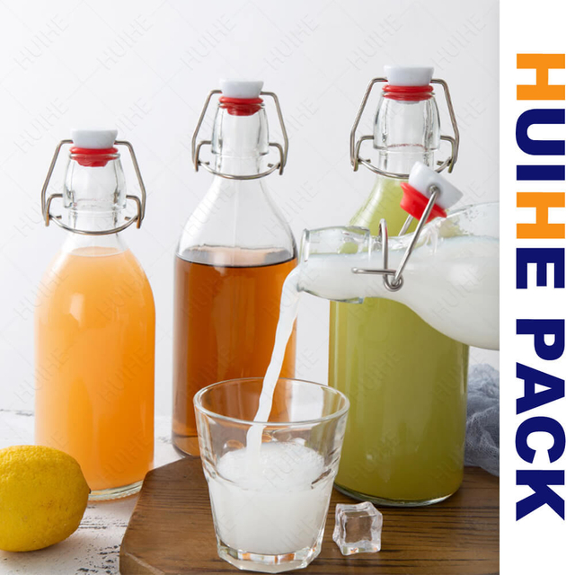 Bottiglia per bevande in vetro trasparente da 350 ml 500 ml 750 ml 1000 ml con parte superiore girevole