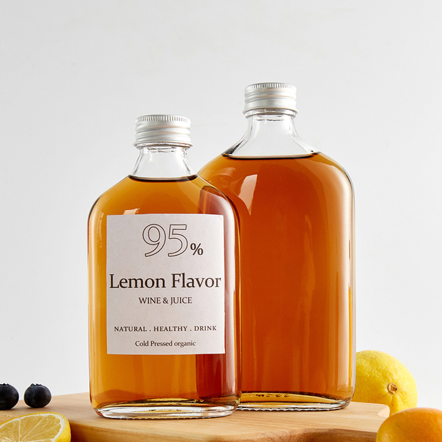 Bottiglie di alcol di palloni piatti in vetro trasparente