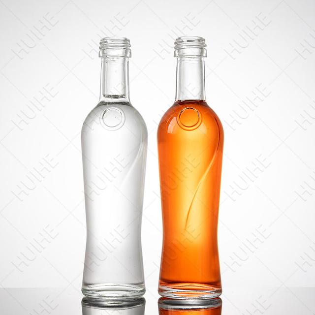 Bottiglie di liquore in miniatura rotonde in vetro trasparente da 50 ml all'ingrosso all'ingrosso