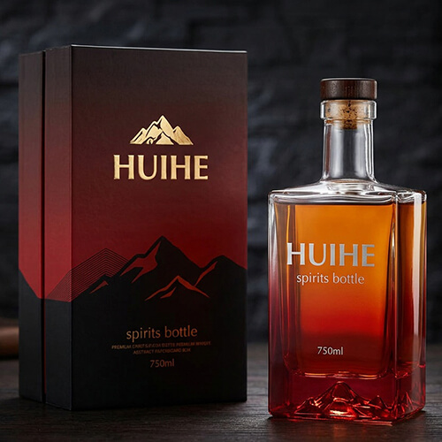 bottiglia di liquore rosso con scatola