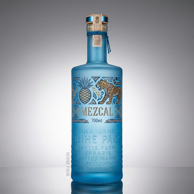 Lettere rialzate bottiglia di liquore in vetro a cilindro