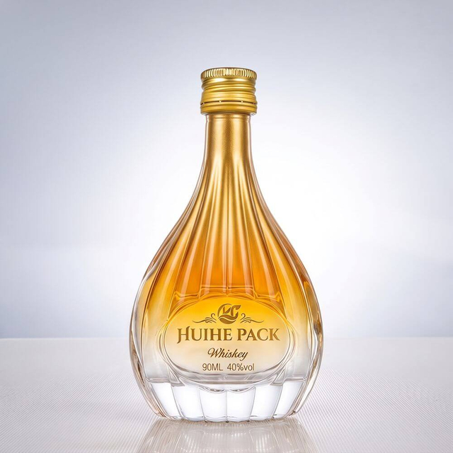 Pere - bottiglia di liquore in vetro a forma di motivi a coste verticali